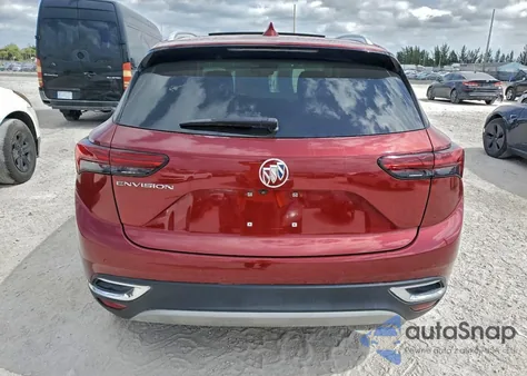 2021 Buick Envision Essence z USA, uszkodzony, nr VIN LRBFZNR40MD103919